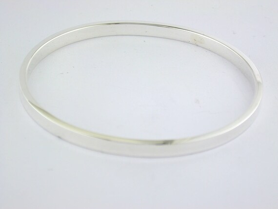Silver bangle price deals