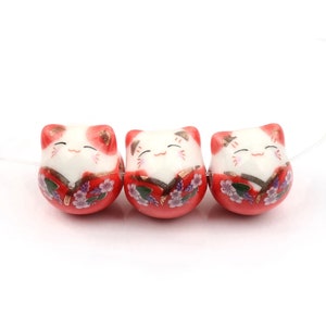 Lucky cat pearl in 7-color porcelain - SOLD individually or in sets of 7 mixed pearls.