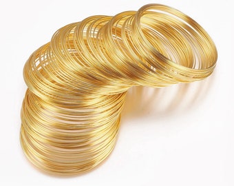 100 Circles of gold-colored steel memory wire Ø60 mm (22 gauge)