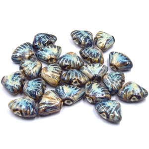 4 glossy blue glazed ceramic shell beads, available in two colors