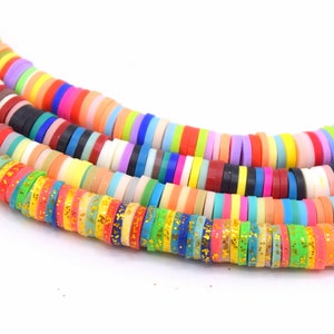 Strang aus 6 mm großen mehrfarbigen Polymer-Heishi-Rundperlen, 4 Farben optional