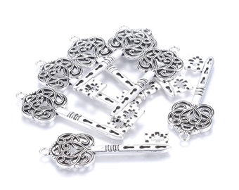 Lot de 4 grands pendentifs clés en métal argenté 60mm