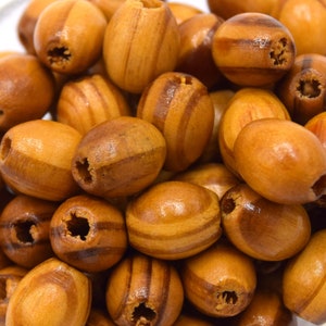 Natural wooden beads oval 10x8mm - pack of 100 units