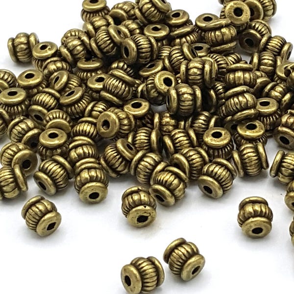 Perles intercalaires métal bronze tonneau 5mm - Lot de 20/50 unités