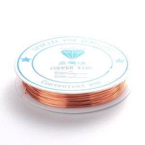 May include: A spool of copper wire for jewelry making. The label reads "Special for Jewelry, Copper Wire, Size: 2, Convenient use".