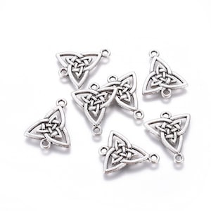 May include: Silver-toned metal charms with a Celtic knot design in the shape of a triangle. The charms have two holes for attaching to jewelry or other crafts.