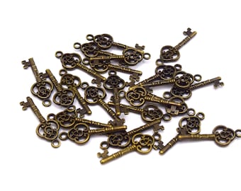 Set of old bronze key charms 29mm