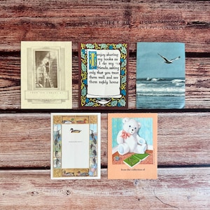 May include: A selection of vintage bookplates with diverse illustrations. One depicts a library, another a quote, a third a seagull over the sea, a fourth with ducks, and the last with a teddy bear.