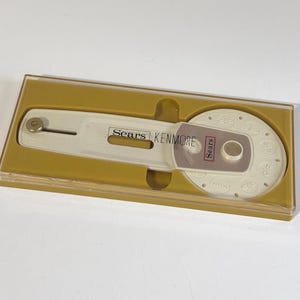 May include: A handmade wooden sign with the text "Welcome to our home" in a handwritten style. The sign is painted white with a distressed finish and a dark brown border. It is designed for indoor or outdoor use.