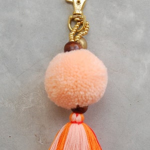 Light Orange Pom Pom Tassel Bag Accessory with Brass Bell image 2