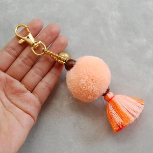 Light Orange Pom Pom Tassel Bag Accessory with Brass Bell image 4
