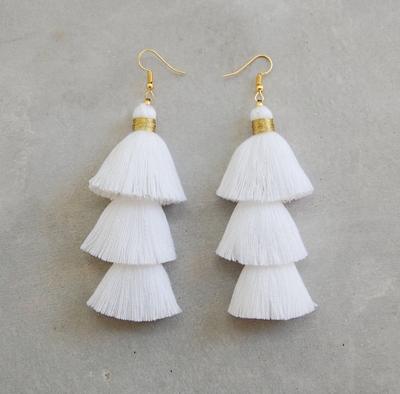 Gold and white tassel best sale earrings