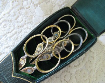 Set of 4 Henkel sewing scissors in original box. ca 1930s.