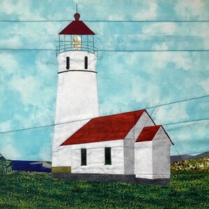 May include: A white lighthouse with a red roof and a white house attached to it. The lighthouse is on a grassy hill with a blue sky and clouds in the background.