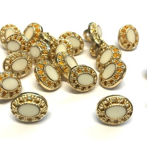 10, tiny 11mm gold metallic and white oval plastic italian buttons with rear shank, oval fancy blouse buttons