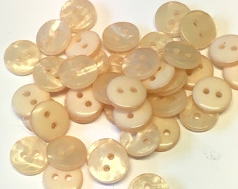 10 st ljusrosa hartsknappar: 9 mm hobbyknappar