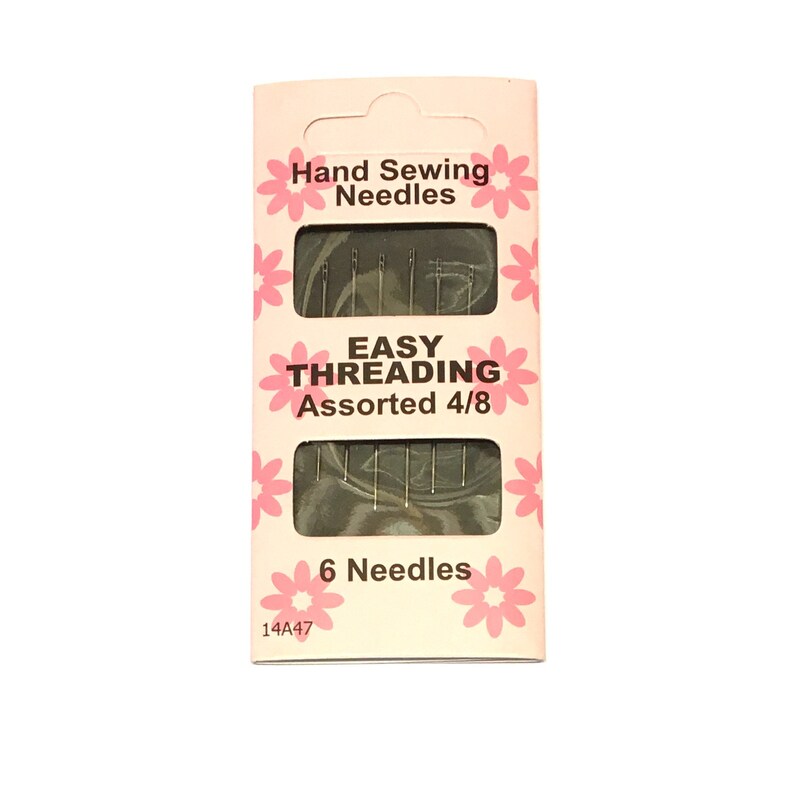 May include: A pink and white package of 6 assorted hand sewing needles. The package says "Easy Threading Assorted 4/8" and "Hand Sewing Needles".