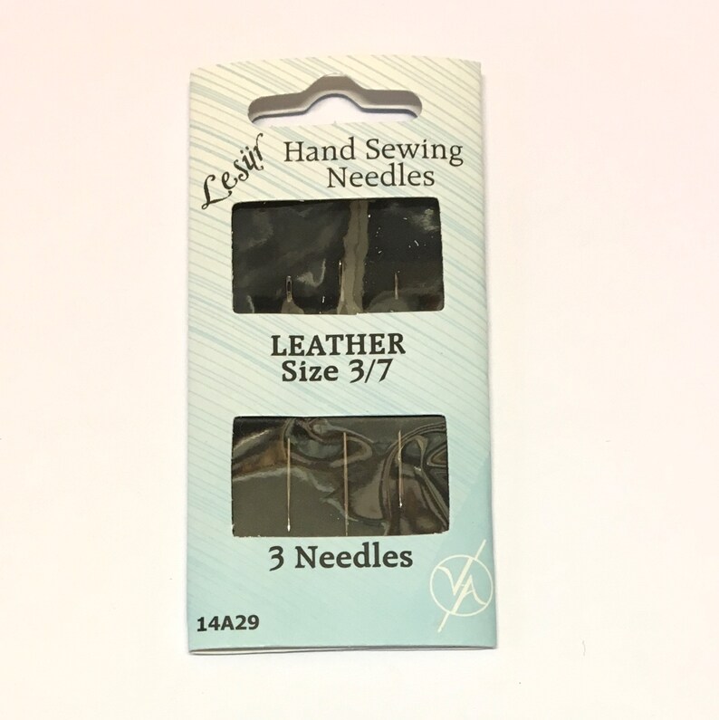 May include: A package of 3 leather sewing needles, size 3/7, from the Leshif brand. The package is blue and white with the text "Hand Sewing Needles" and "Leather Size 3/7".