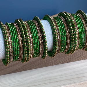 Grüne und goldene Armreifen aus Garn – Größe 2,8