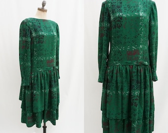 60’s soft wool drop waist green tent dress boat neck, puff sleeves, tiered skirt with bow. Medium Large 60s wool dress