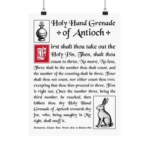 May include: A white poster with the text "Holy Hand Grenade of Antioch" and a detailed illustration of a grenade. The poster includes text from Armaments, Chapter Two, Verses Nine to Twenty-One, and a drawing of a rabbit.