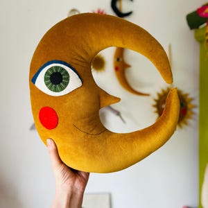 Gold cotton velvet crescent moon cushion