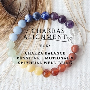 May include: A colorful beaded bracelet with seven chakra stones. The bracelet is on a white background with the text "7 CHAKRAS ALIGNMENT FOR: CHAKRA BALANCE PHYSICAL, EMOTIONAL & SPIRITUAL WELL-BEING".