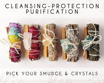 May include: Five smudge sticks with crystals, each tied with twine. The smudge sticks are wrapped in dried flowers and leaves. The crystals are amethyst, citrine, clear quartz, turquoise, and a dark green stone. The text "CLEANSING-PROTECTION PURIFICATION" is at the top of the image. The text "PICK YOUR SMUDGE & CRYSTALS" is at the bottom of the image.