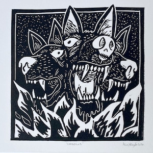 May include: Black and white linocut print of a three-headed dog with a skull for an eye. The dog is surrounded by a dark background with white stars. The print is titled "Cerberus" and signed by the artist.