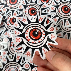 Pegatina de vinilo de mal de ojo. Una calcomanía gótica de diablo para papelería. Decoración para cuadernos, botellas o portátiles.