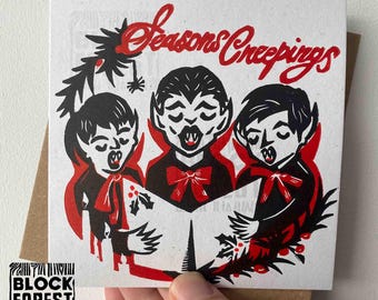Vampire Carolling Linocut Christmas Card. Festive Gothic Creepmas and Gothmas Greetings.