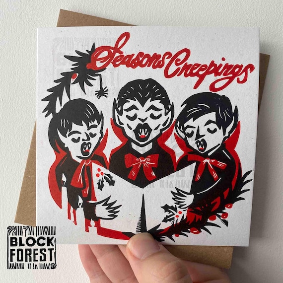 Vampire Carolling Linocut Christmas Card. Festive Gothic Creepmas and Gothmas Greetings.