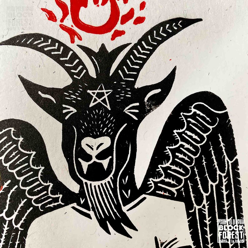 May include: Black and white illustration of a winged goat with a pentagram on its forehead. The goat is surrounded by a red flame.