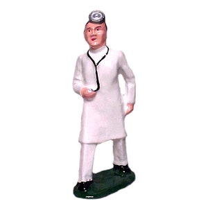 May include: A white figurine of a doctor wearing a white coat and a stethoscope. The doctor is standing on a green base and has a stethoscope around their neck.