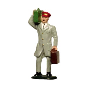 May include: A miniature figurine of a person wearing a gray suit, a red cap, and holding a green suitcase and a brown briefcase.
