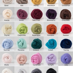 May include: A grid of 25 balls of colorful wool roving. Colors include sand, ash, honey, marakech, cinnamon, acacia, onion, soft fruit, blackberry, chocolate, thyme, caipirinha, asparagus, pumpkin, passion, sunrise, paradise, ireland, cobalt, tuareg, etoile, shell, cyclamen, twilight, lilac, natural white, cloud, storm, and black.