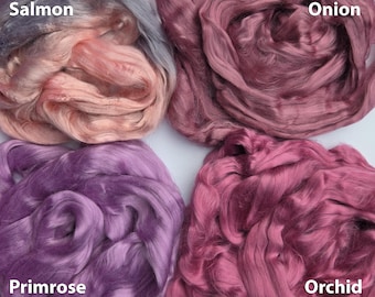 May include: Four different colors of silk fiber, labeled "Salmon", "Onion", "Primrose", and "Orchid".