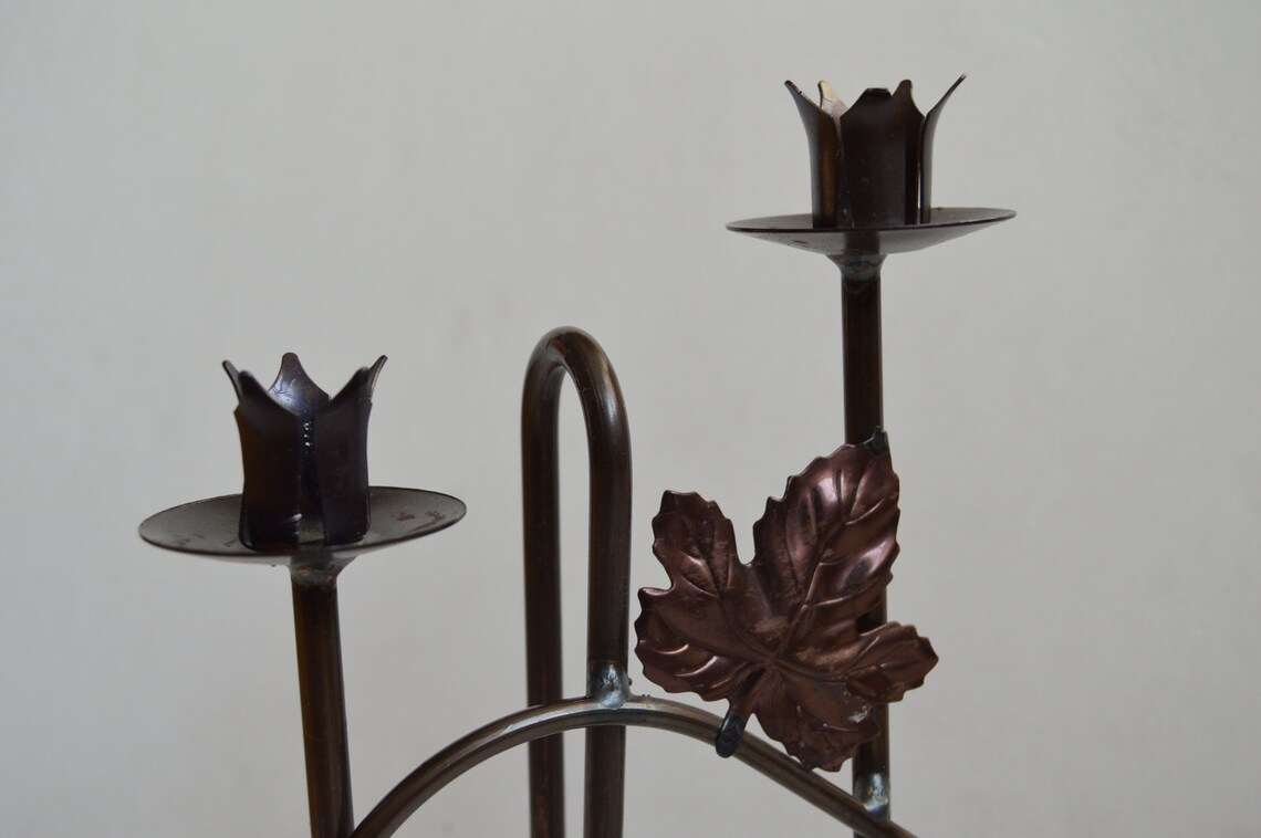 black metal wine bottle holder