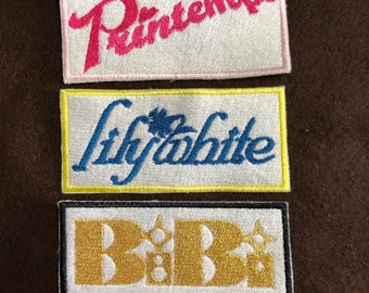 Love Live! Muse sub unit naszywki i charmsy BiBi, Lilywhite i Printemps.