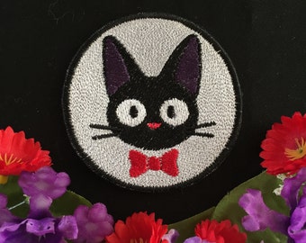 Jiji, Charm, Aufnäher