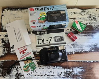 Cámara compacta Fuji DL-7 de 35 mm, estilo vintage, con flash incorporado, nueva en caja, de la década de 1980.