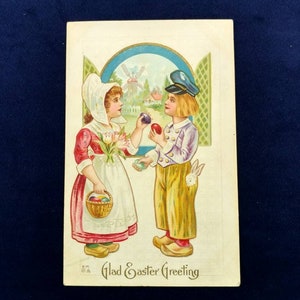 Easter Postcard "Glad Easter Greeting" Holland Scene Little Dutch Girl & Boy Tulips Rabbit Eggs Used Antique Postcard