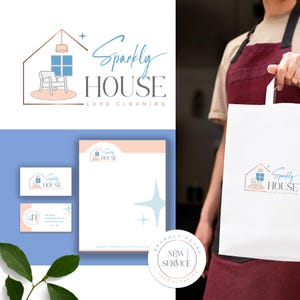 May include: A logo and branding design for "Sparkly House Luxe Cleaning". The logo features a house outline with a chair, window, and light fixture. Business cards, letterhead, and a shopping bag with the logo are also shown.