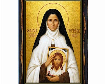 May include: A rectangular religious icon featuring Saint Thérèse of the Child Jesus and the Holy Face. The figure wears a black and white habit against a gold background. The text reads SAINT OF THE CHILD JESUS and THÉRÈSE OF THE HOLY FACE.