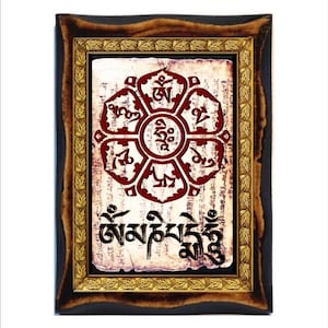 Om mani padme hum &quot;lotus flower&quot;  the mantra in Tibetan with the six syllables colored  Icon on wood plaque