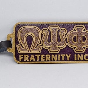 Massively OWT - Omega Psi Phi &quot;Mesmerizer 2&quot; Luggage Tag -  Omega Psi Phi, fraternity Gift, Que Dawg, cigar bruh, RQQ, 1911,