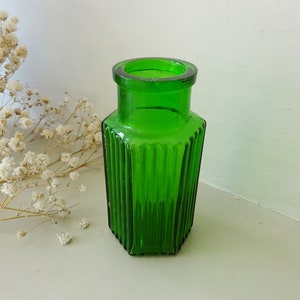 Antique green hexagonal ribbed poison bottle, wide mouthed bright green Victorian or Edwardian pharmacy bottle, Wood Bros chemist bottle