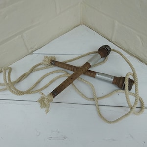 Vintage skipping rope with antique wooden textile mill bobbins / spools for handles. Children&#39;s vintage toy, old vintage toys, nursery decor