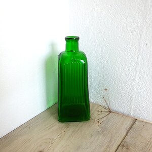 Vintage large green Izal bottle, ribbed on one side, pyramid shaped Izal disinfectant bottle, old chemist bottle, early to mid 20th century
