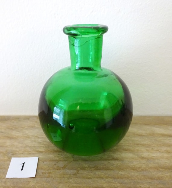 old green perfume bottle